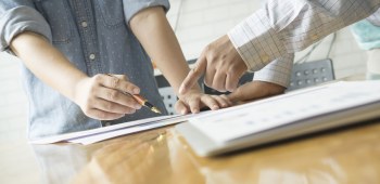 Team work concept,team meeting,man and woman working in the office. collaborative teamwork. Project managers meeting.business crew working with new startup. Analyze plans.selective focus,vintage color
