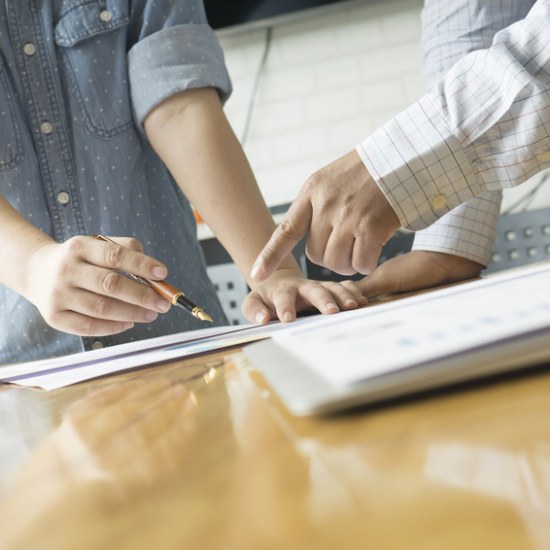 Team work concept,team meeting,man and woman working in the office. collaborative teamwork. Project managers meeting.business crew working with new startup. Analyze plans.selective focus,vintage color